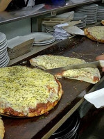 La pizza de muzzarella es la más popular del país, con casi el 34% de las preferencias