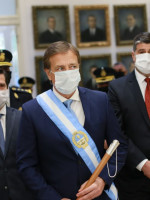 Suarez se prepara para dar su discurso del 1º de Mayo, y los gremios, para salir a la calle